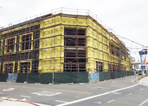 The Pike shopping mall under construction, studs and framing exposed